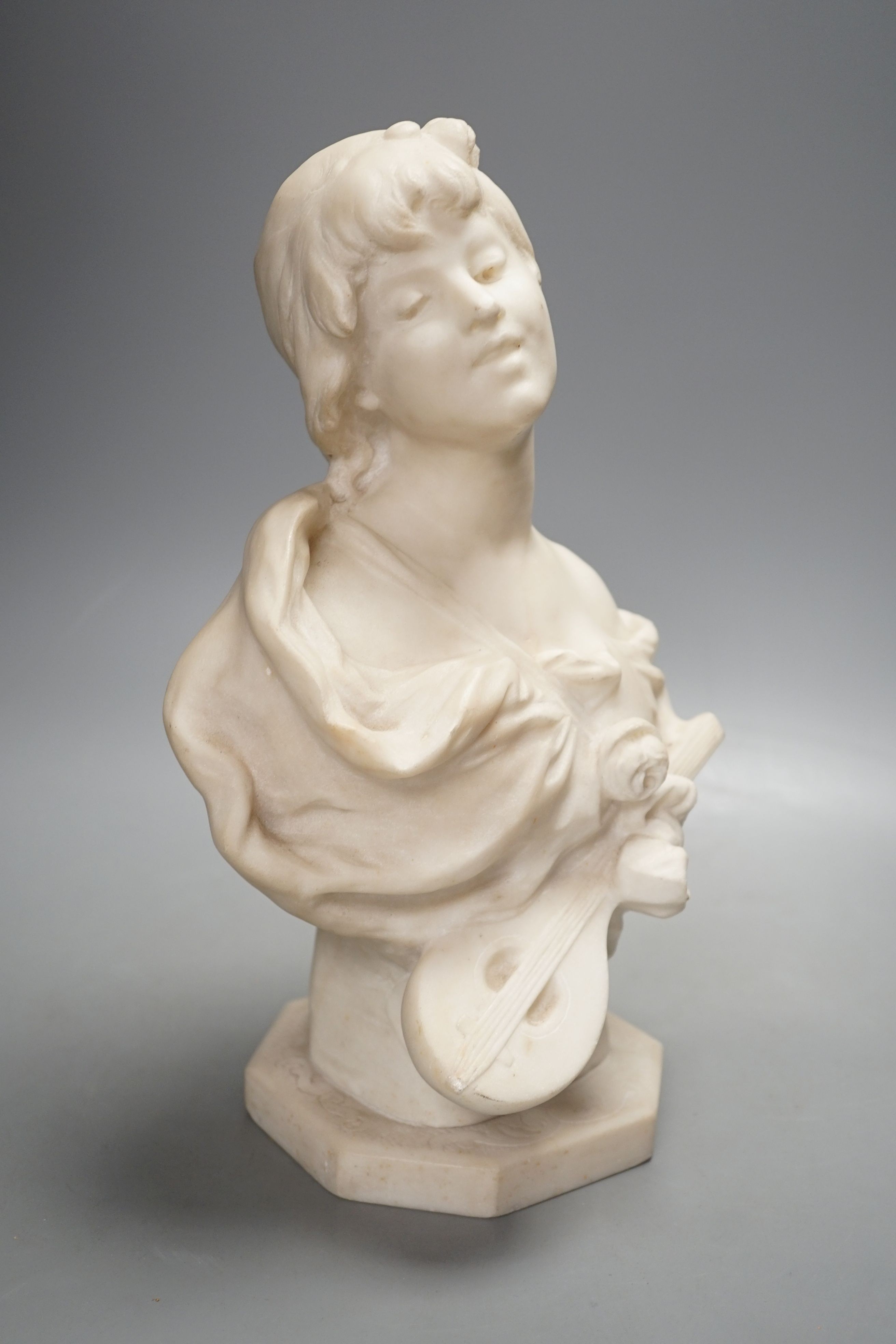 Auguste Moreau (1834-1917) marble bust of a lady, retailers mark for Atelier Merlini, signed , 35 cms high